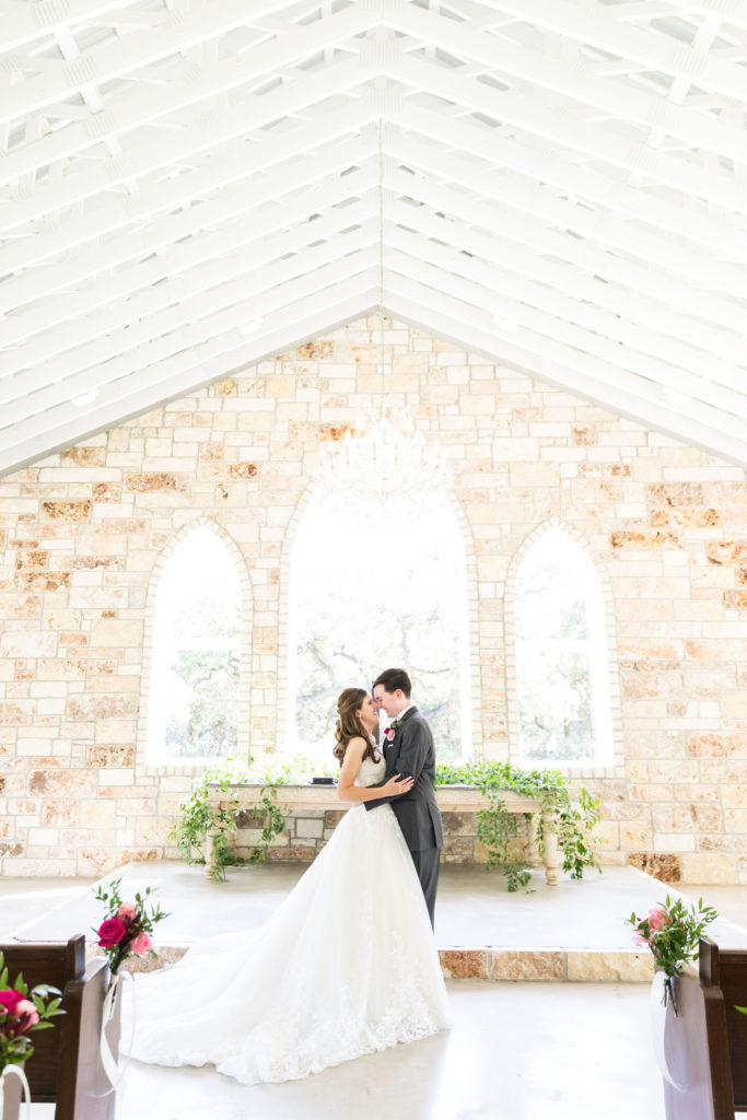 Berry and Burgundy themed summer wedding at Chandelier of Gruene in New Braunfels, Texas with planning by Touch of Whimsy. Photography by Dawn Elizabeth Studios.