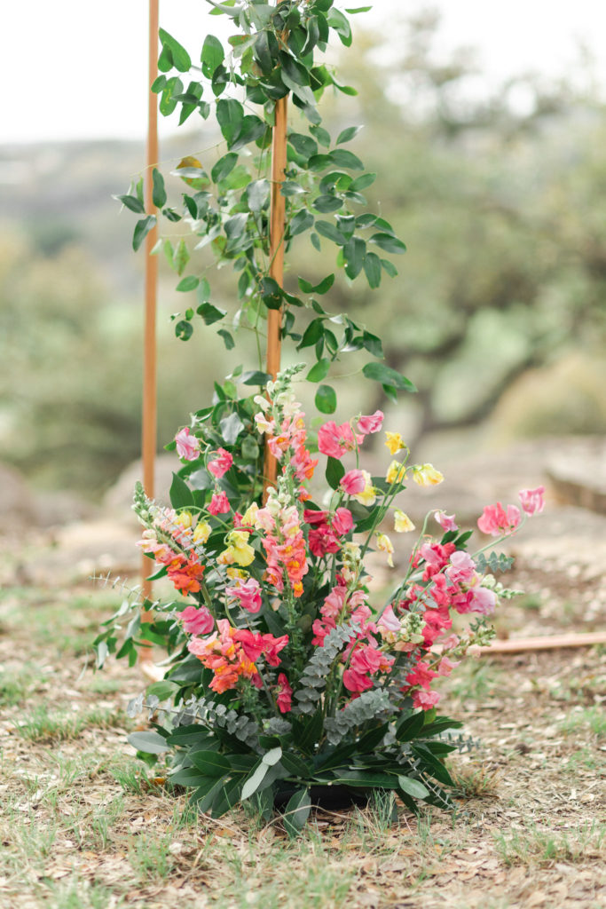 Close up look at the ceremony arch flowers created by Touch of Whimsy at Oakfire Ridge