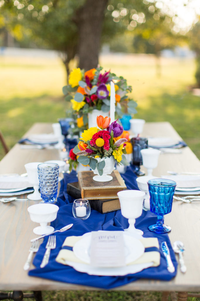 Touch of Whimsy creates a colorful fall floral spread for a fellow planning company, Hamilton Wedding Finishings at the New Braunfels Library complete with milk glass and ice cream. Photography by Pine and Blossom.